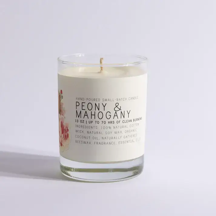 a candle in a glass jar