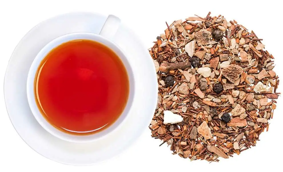 Spicy Herbal Chai with warming spices, ginger, and a steaming cup of caffeine-free herbal tea