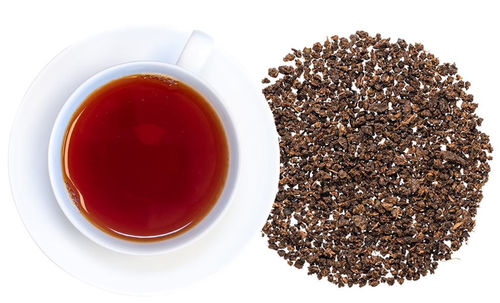 Organic Canadian Maple Fudge Tea with maple syrup and creamy black tea in a cozy autumn tea setting