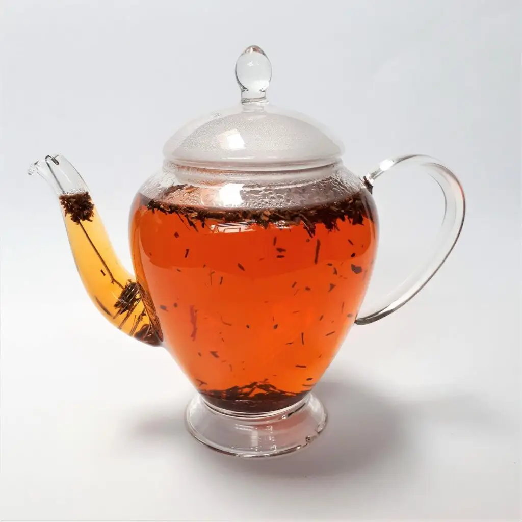 Organic rooibos tea in glass teapot