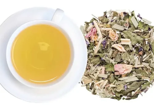 Organic Pitta Ayurveda herbal tea with calming spices and herbs in a peaceful wellness setting